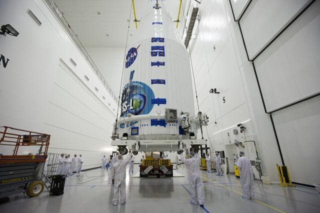 NASA image: TDRS-L Spacecraft is Lifted Onto Transporter