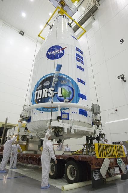 NASA image: TDRS-L Spacecraft is Lifted Onto Transporter