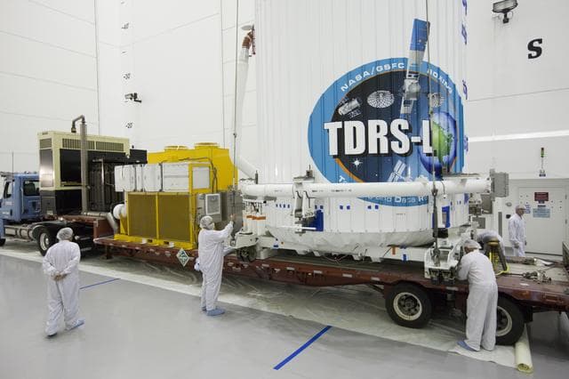 NASA image: TDRS-L Spacecraft is Lifted Onto Transporter