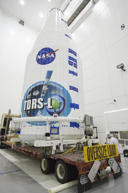 NASA image: TDRS-L Spacecraft is Lifted Onto Transporter