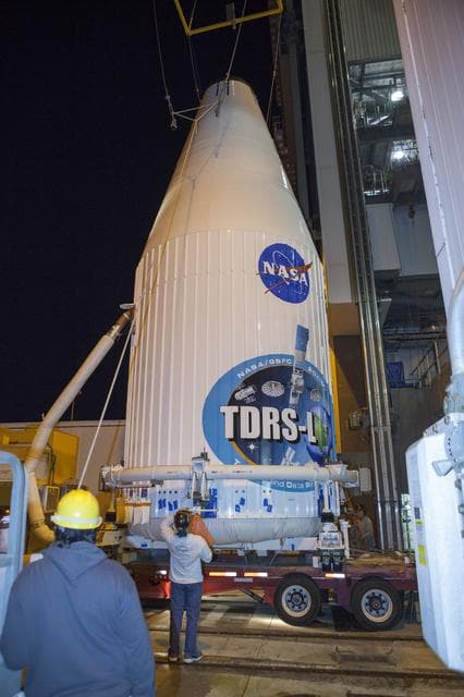NASA image: TDRS-L spacecraft lift to mate on Atlas V