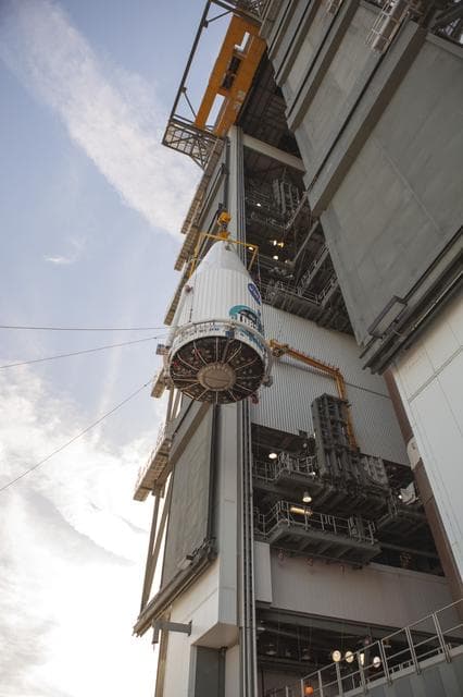NASA image: TDRS-L spacecraft lift to mate on Atlas V
