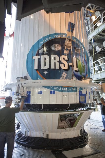 NASA image: TDRS-L spacecraft lift to mate on Atlas V