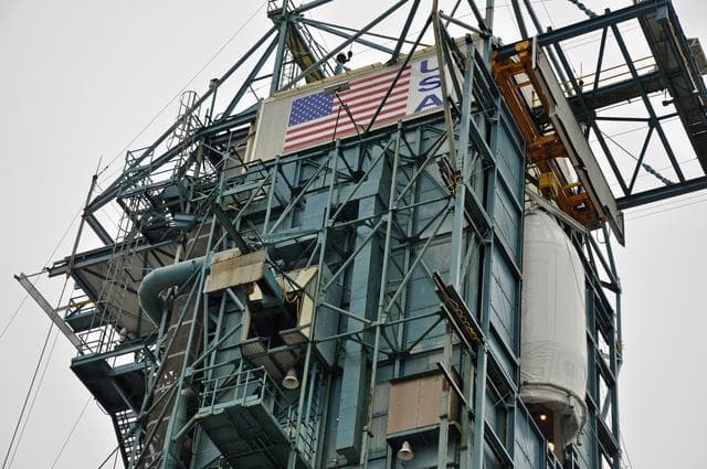 NASA image: OCO-2: Hoisting the Fairing Halves up the MST