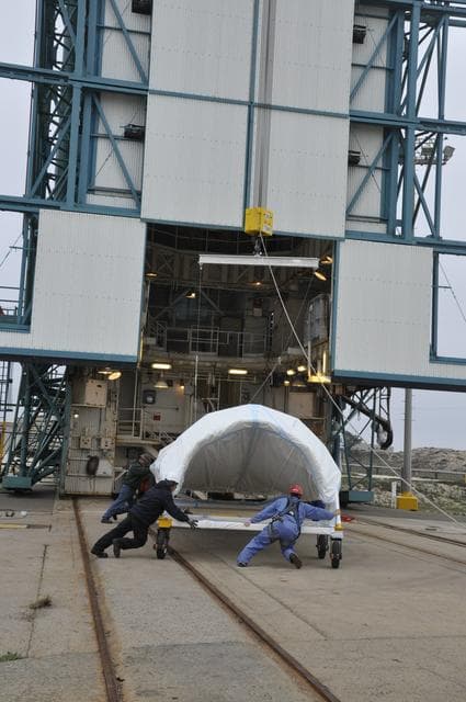 NASA image: OCO-2: Hoisting the Fairing Halves up the MST