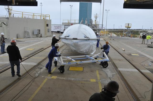 NASA image: OCO-2: Hoisting the Fairing Halves up the MST
