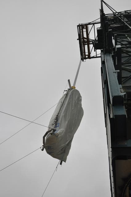 NASA image: OCO-2: Hoisting the Fairing Halves up the MST