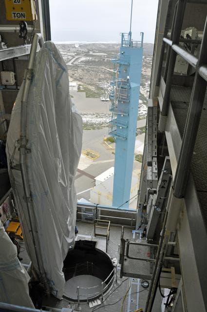 NASA image: OCO-2: Hoisting the Fairing Halves up the MST