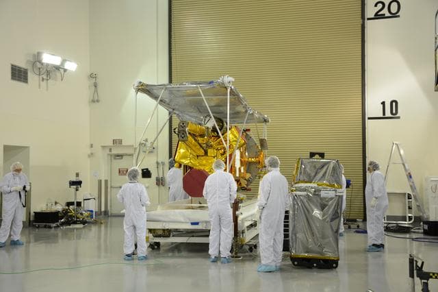 NASA image: SMAP Spacecraft Rotate & Placed on Fixture