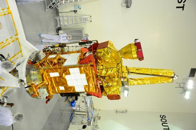 NASA image: SMAP Spacecraft Rotate & Placed on Fixture