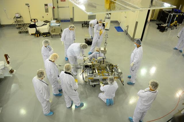 NASA image: SMAP Spacecraft Rotate & Placed on Fixture