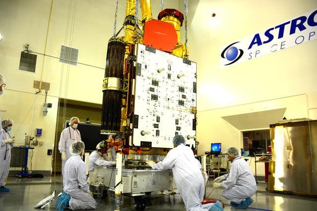 NASA image: SMAP Spacecraft Rotate & Placed on Fixture