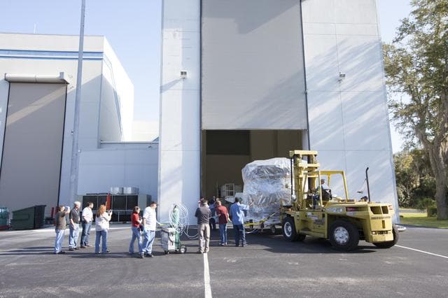 NASA image: MMS Move from Bay 2 and Unbagging