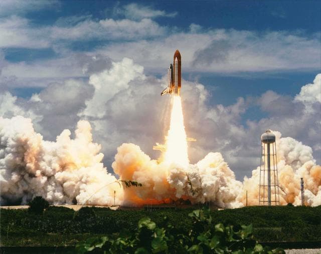 NASA image: KENNEDY SPACE CENTER, FLA. - The second International Microgravity Laboratory-2 (IML-2) is off to an ontime start as the Space Shuttle Columbia lifts off from Launch Pad 39A at 12:43:00 p.m. EDT.  On board are a crew of seven and more than 80 investigations developed by more than 200 scientists from 13 countries.  The IML-2 complement includes materials science, bioprocessing, space and radiation biology, and human physiology experiments that will be carried out over the course of the 14-day flight.  The commander of Space Shuttle Mission STS-65 is Robert D. Cabana.  James D. Halsell Jr. is the pilot; the payload commander is Richard J. Hieb; the three mission specialists are Carl E. Walz, Leroy Chiao and Donald A. Thomas.  Dr. Chiaki Mukai, representing NASDA, the National Space Development Agency of Japan, is the payload specialist.  Mukai becomes the first Japanese woman to fly into space.