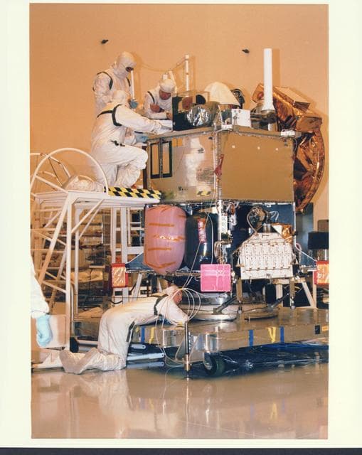 NASA image: KENNEDY SPACE CENTER, FLA. -  In the Payload Hazardous Servicing Facility at KSC, installation is under way of the Mars Orbiter Camera (MOC) on the Mars Global Surveyor spacecraft.  The MOC is one of a suite of six scientific instruments that will gather data about Martian topography, mineral distribution and weather during a two-year period.  The Mars Global Surveyor is slated for launch aboard a Delta II expendable launch vehicle on Nov. 6, the beginning of a 20-day launch period.