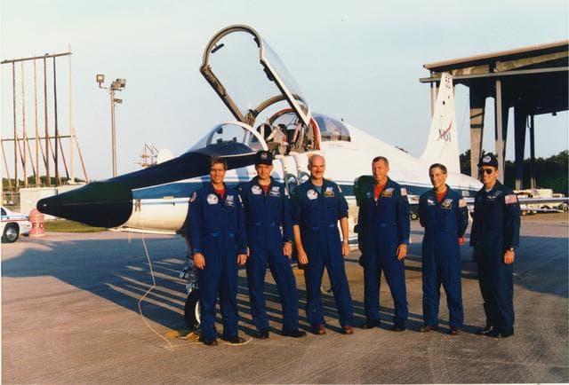 NASA image: KENNEDY SPACE CENTER, FLA. -  The STS-79 astronauts arrive at KSC's Shuttle Landing Facility in their T-38 aircraft from Johnson Space Center in Houston.  From left are Mission Specialists John E. Blaha and Tom Akers; Commander William F. Readdy; PIlot Terrence W. Wilcutt; and Mission Specialists Jay Apt and Carl E. Walz.  The astronauts are at KSC for the Terminal Countdown Demonstration Test, a dress rehearsal for launch.  They are scheduled to lift off around Sept. 12 on Mission STS-79, the fourth docking between the U.S. Shuttle and Russian Space Station Mir.