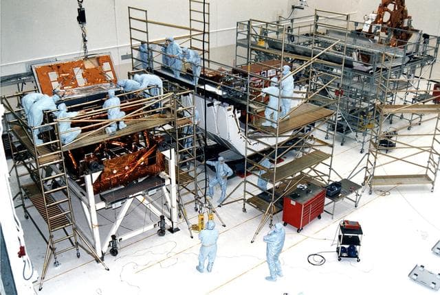 NASA image: KENNEDY SPACE CENTER, FLA. - Workers in KSC's Vertical Processing Facility make final prelaunch prepartions to various payload elements that are part of the second Hubble Space Telescope (HST) servicing mission, STS-82.  Liftoff is targeted Feb. 11 aboard Discovery with a crew of seven.