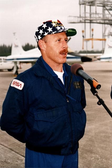 NASA image: KENNEDY SPACE CENTER, FLA. -   STS-82 Mission Commander Kenneth D. Bowersox greets media representatives after arrival at KSC's Shuttle Landing Facility.  Bowersox and the other six members of the STS-82 crew came from their home base at Johnson Space Center in Houston, Texas, to spend the last few days before launch at KSC.  STS-82 is scheduled for liftoff on Feb. 11 during a 65-minute launch window that opens at 3:56 a.m. EST.  The 10-day flight aboard the Space Shuttle Discovery will be the second Hubble Space Telescope (HST) servicing mission.