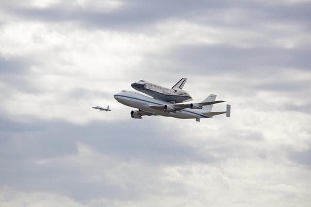 NASA image: Space Shuttle Discovery mounted atop a NASA 747 Shuttle Carrier 