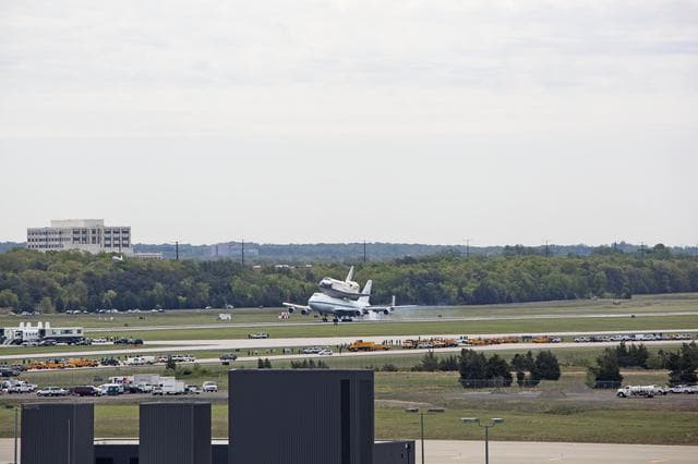 NASA image: Space Shuttle Discovery mounted atop a NASA 747 Shuttle Carrier 
