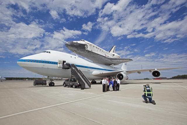 NASA image: Space Shuttle Discovery mounted atop a NASA 747 Shuttle Carrier 