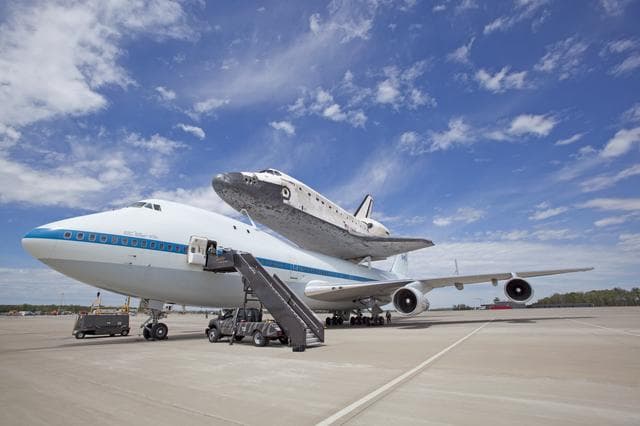 NASA image: Space Shuttle Discovery mounted atop a NASA 747 Shuttle Carrier 