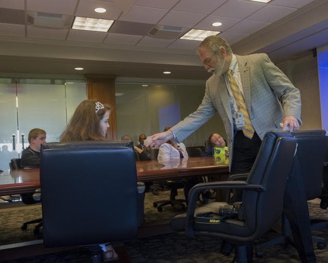 NASA image: Dale Thomas with students from the Tennessee School for the Blind