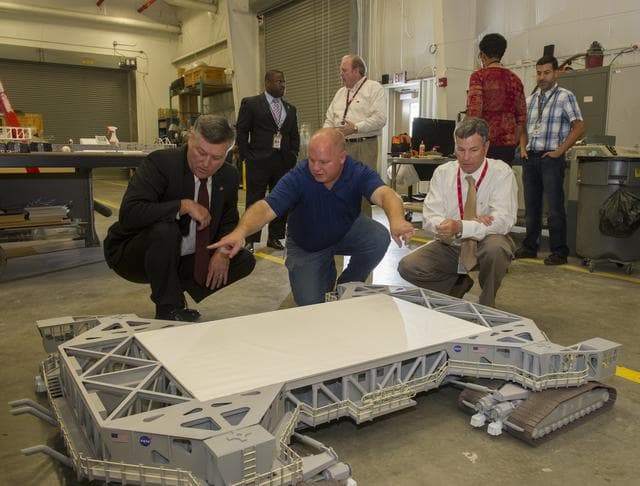 NASA image: MSFC center director, Patrick Scheuermann, tours the center model shop