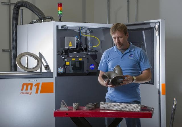 NASA image: ADVANCED MANUFACTURING TEAM