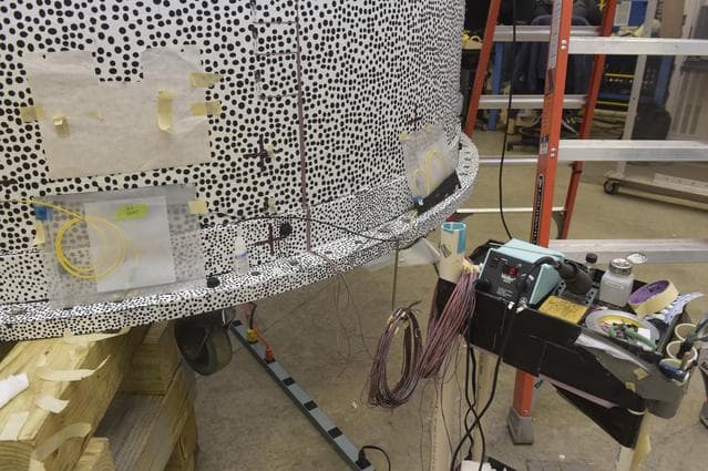 NASA image: INSTALLATION OF STRESS SENSORS TO SBKF COMPOSITE TANK
