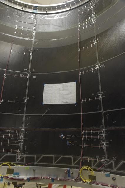 NASA image: INSTALLATION OF STRESS SENSORS TO SBKF COMPOSITE TANK