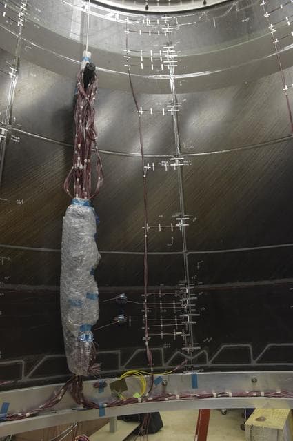 NASA image: INSTALLATION OF STRESS SENSORS TO SBKF COMPOSITE TANK