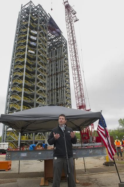 NASA image: PHIL HENDRIX AT TEST STAND 4693 TOPPING OUT