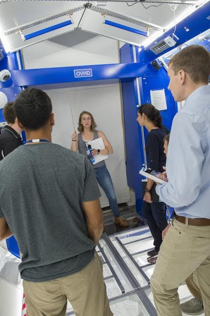 NASA image: Boeing trainers conduct simulations inside the Boeing Exploratio