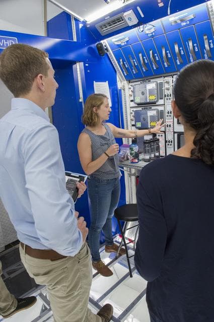 NASA image: Boeing trainers conduct simulations inside the Boeing Exploratio