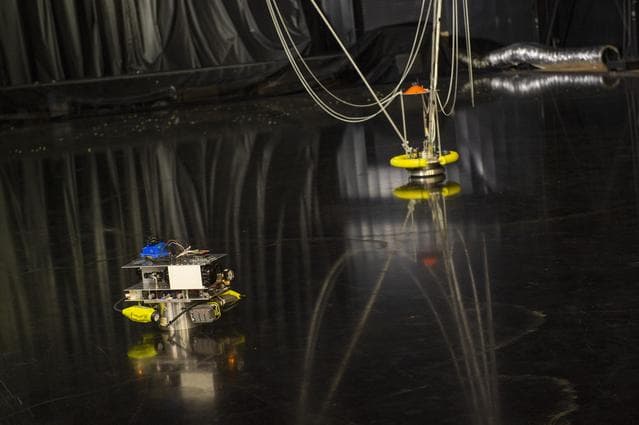 NASA image: STEERABLE AIR BEARING TETHER DEPLOYMENT