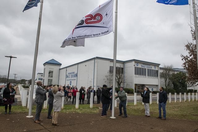 NASA image: Associate Administrator Douglas Loverro Participates in the Hanging of the ISS Flag