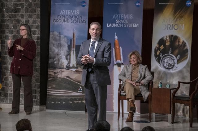 NASA image: Associate Administrator Douglas Loverro Participates in the Hanging of the ISS Flag
