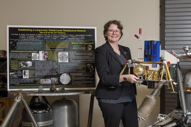 NASA image: MSFC Chief Scientist Renee Weber with Lunar Lander Models