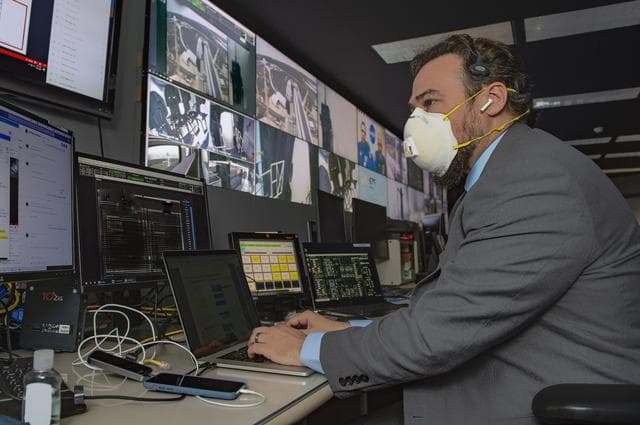 NASA image:  Adam Butt and Teams at NASA’s Marshall Space Flight Center help monitor launch conditions for the Demo-2 mission from the Huntsville Operations Support Center, HOSC.