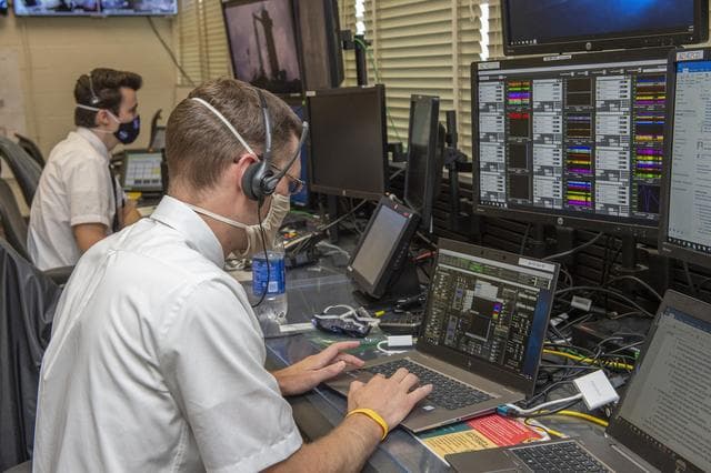 NASA image: Stewart Whaley, Cameron Muelling, foreground, and teams at NASA’s Marshall Space Flight Center help monitor launch conditions for the Demo-2 mission from the Huntsville Operations Support Center, HOSC.