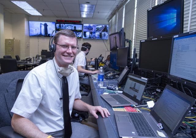  Adam Butt and Teams at NASA’s Marshall Space Flight Center help monitor launch conditions for the Demo-2 mission from the Huntsville Operations Support Center, HOSC.