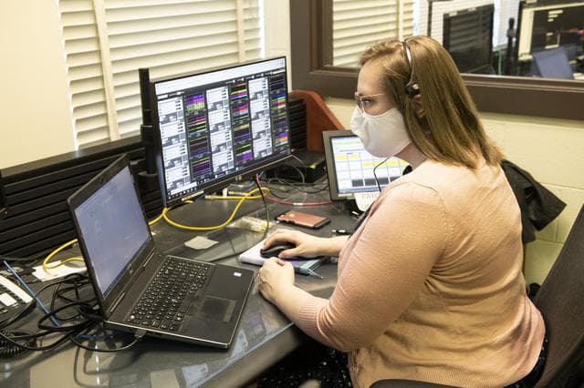 NASA image: Crystal Klemmer, an Aerodyne Industries engineer at Marshall, monitors the Crew-1 launch from the mission control room in Marshall’s Huntsville Operations Support Center.