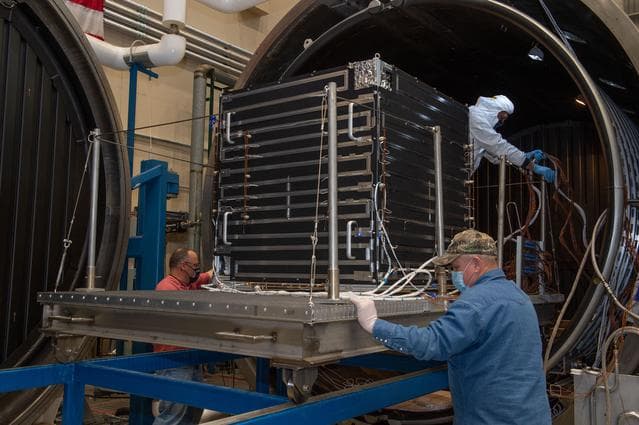 NASA image: Removal of hot box containing NEA Scout spacecraft from Thermal Vacuum Chamber V15   1 of 2