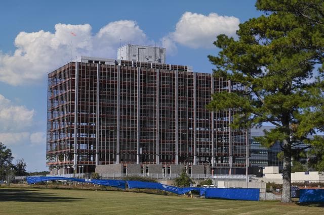 NASA image: NASA Marshall Space Flight Center campus buildings during demoli