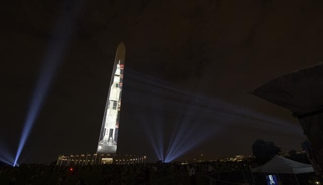 NASA image: Apollo 11 Saturn V Rocket Projected On The Washington Monument