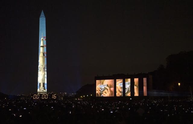 NASA image: Apollo 11 Saturn V Rocket Projected On The Washington Monument