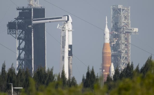 NASA image: NASA’s SLS and SpaceX’s Falcon 9 at Launch Complex 39A & 39B