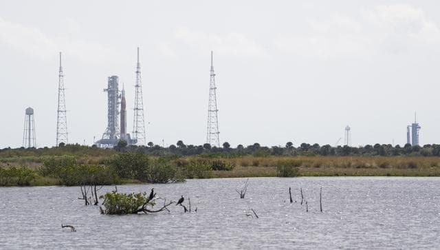 NASA image: NASA’s SLS and SpaceX’s Falcon 9 at Launch Complex 39A & 39B