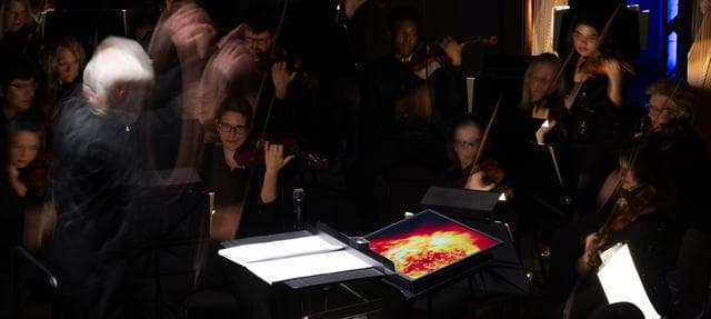 NASA image: National Philharmonic Performs Cosmic Cycles: A Space Symphony
